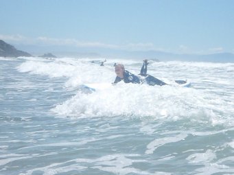 Surfing at Sumner Beach, NZ